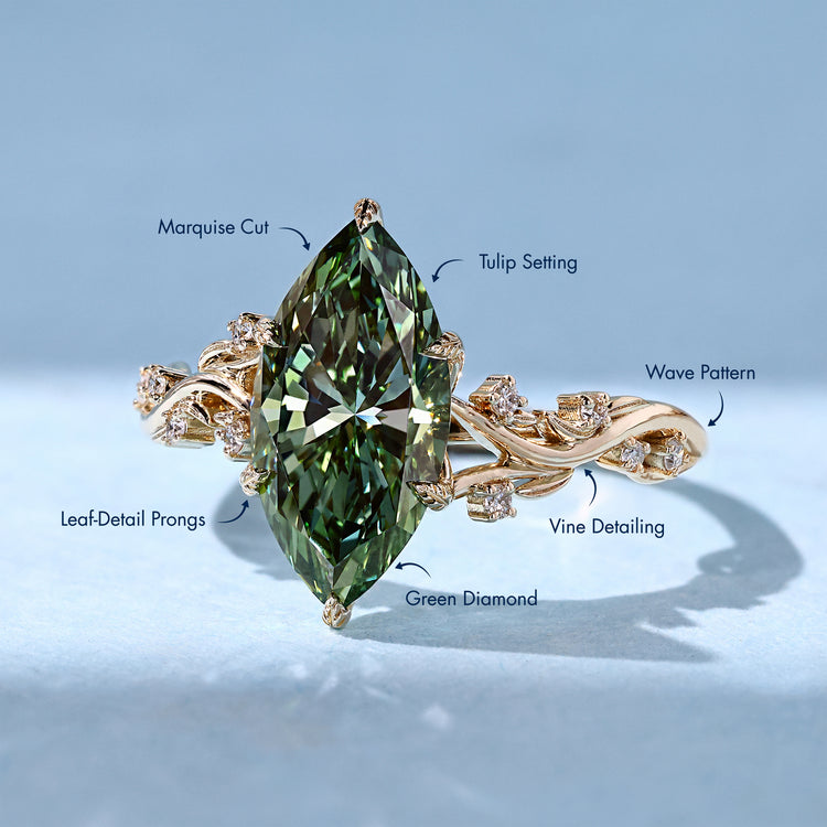 Handmade marquise diamond ring with round side stones.