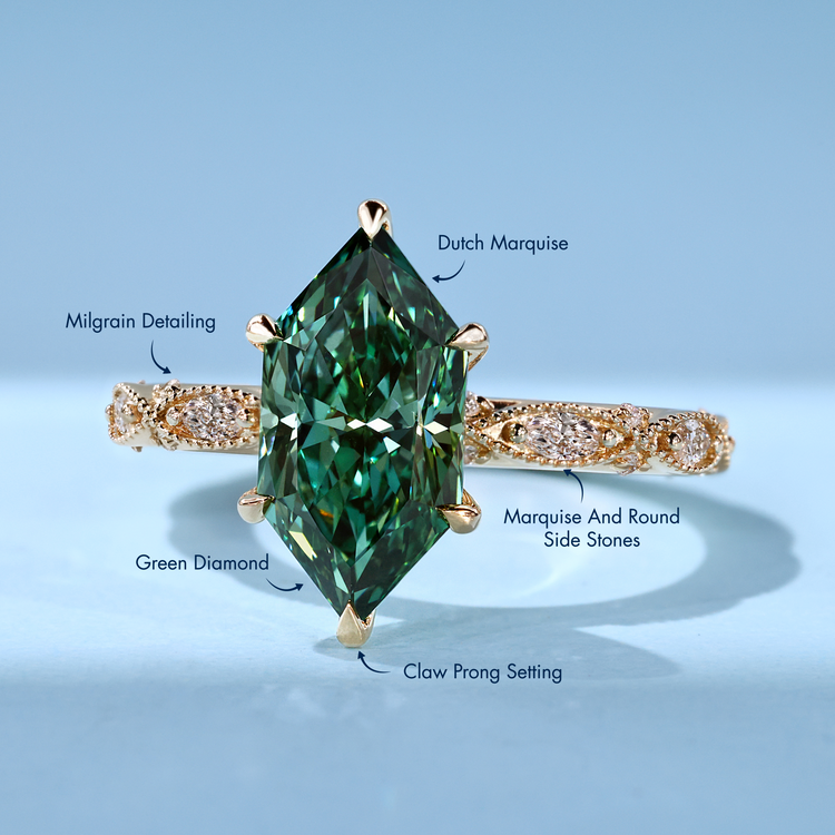 Vintage engagement ring with green marquise diamond and milgrain details.