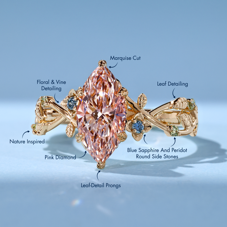 Marquise cut diamond ring with leaf and flower design.