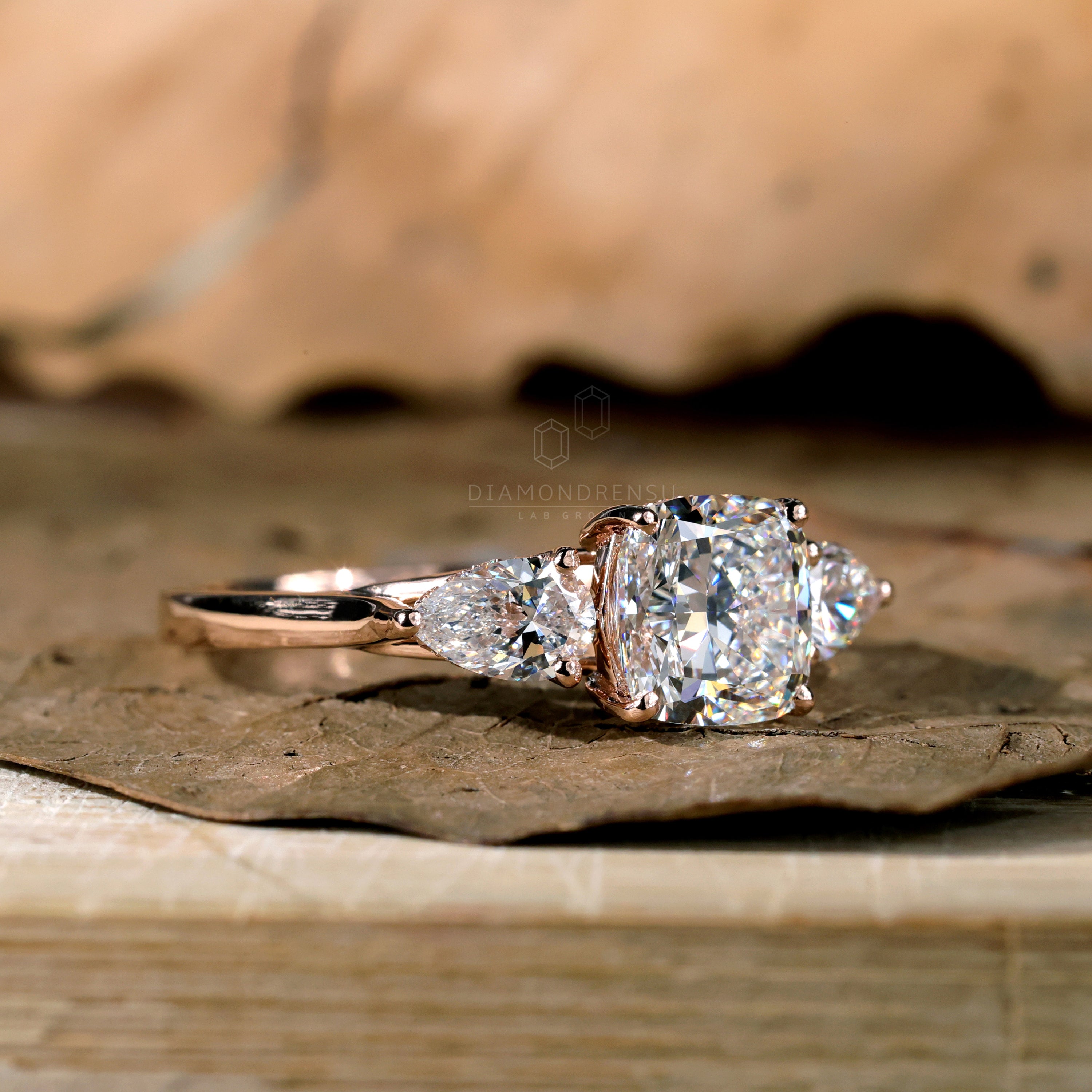 Antique-inspired three stone antique engagement ring.