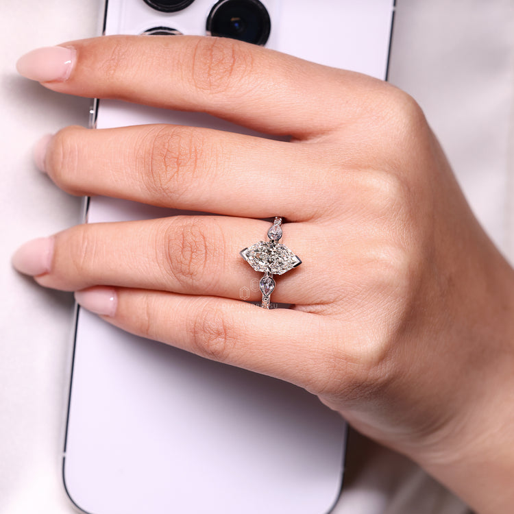 Three stone marquise ring with euro shank design