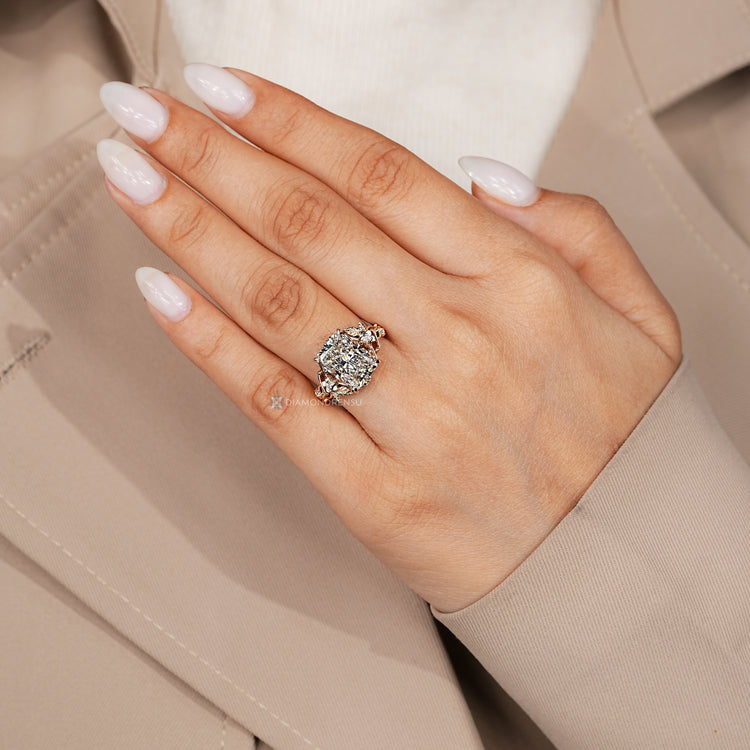 Lab grown radiant diamond ring with floral details.