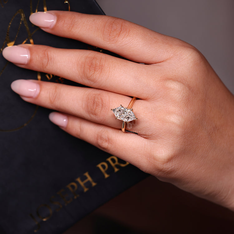 IGI certified marquise diamond ring with cathedral style band.