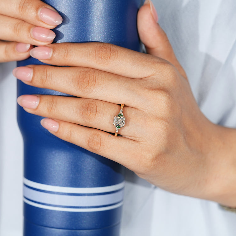 Handmade cushion cut diamond ring with tulip setting.