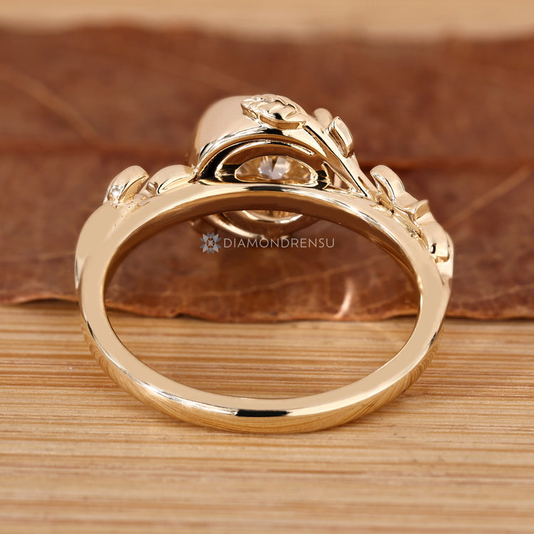 IGI certified round diamond ring with half bezel setting.