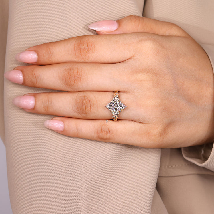 Marquise cut ring with round side stones handmade.