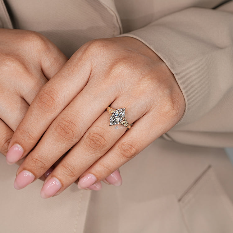 Marquise engagement ring with vintage style and split shank.