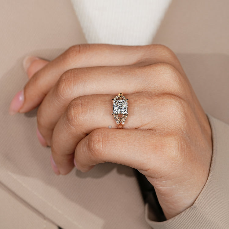 IGI certified princess cut diamond ring with round side stones.