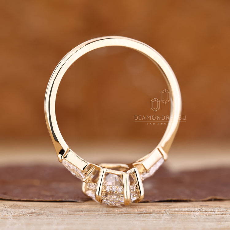 IGI certified ring with marquise diamond and halo setting.
