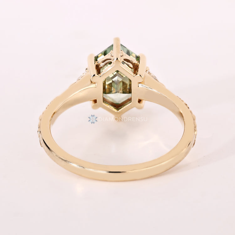 Handmade hexagon diamond ring with three stone style.