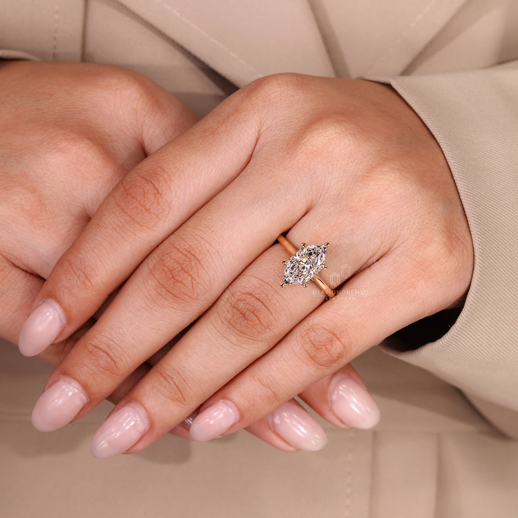 Lab grown marquise ring with cathedral and tulip setting.