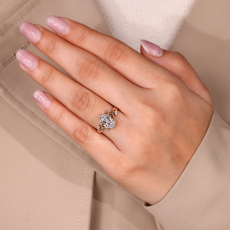 IGI certified nature ring with marquise and round stones.