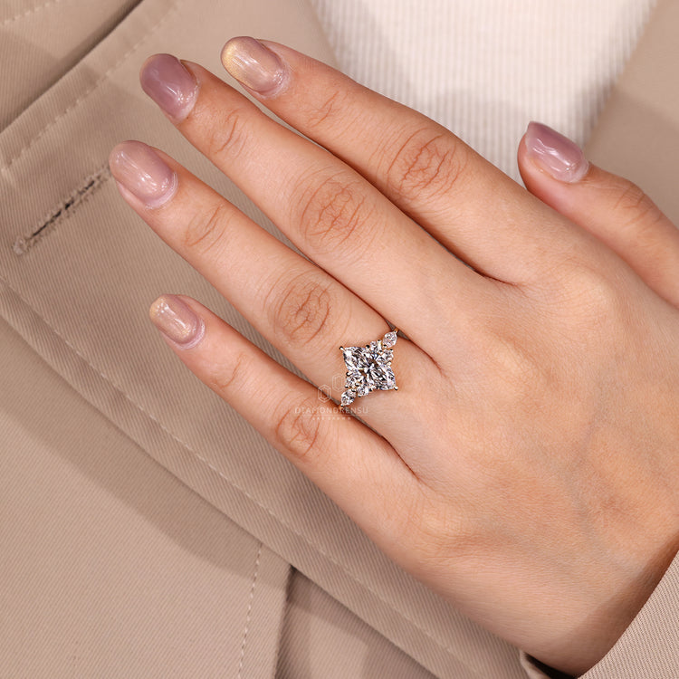 Handmade marquise diamond ring with tapered shank band.