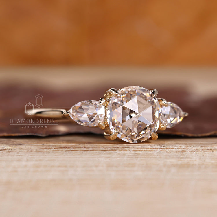 IGI certified rose cut diamond ring with side stones.
