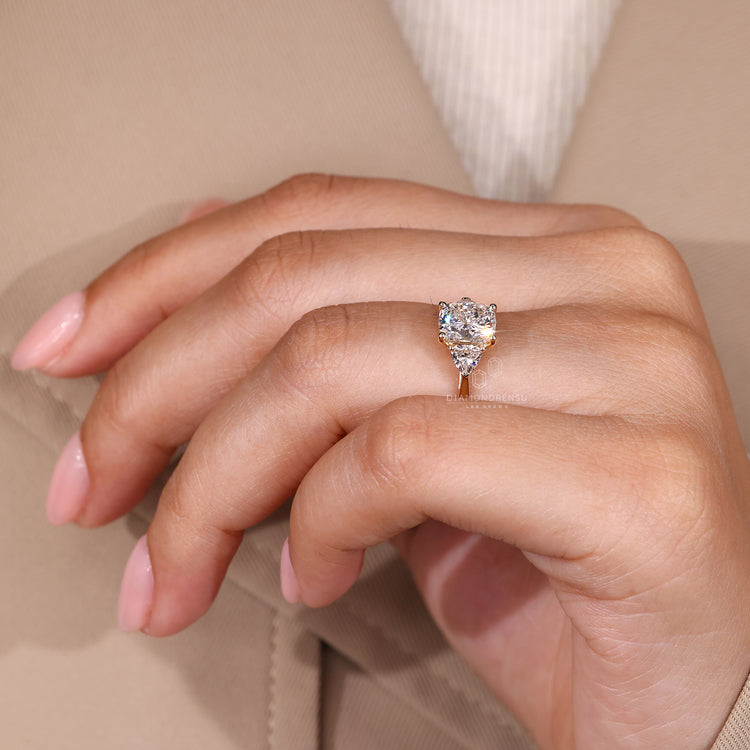 Lab grown cushion diamond ring with four prong setting.
