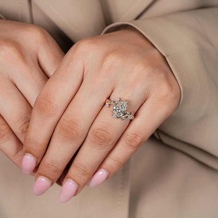 Lab grown diamond ring with pear cut centre stone.