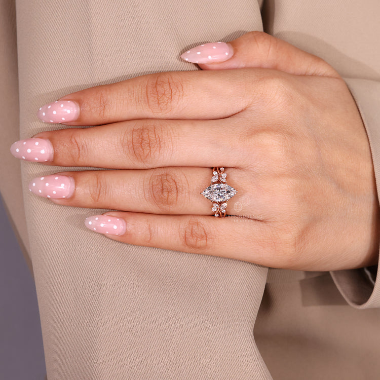 Nature inspired diamond ring with marquise centre stone
