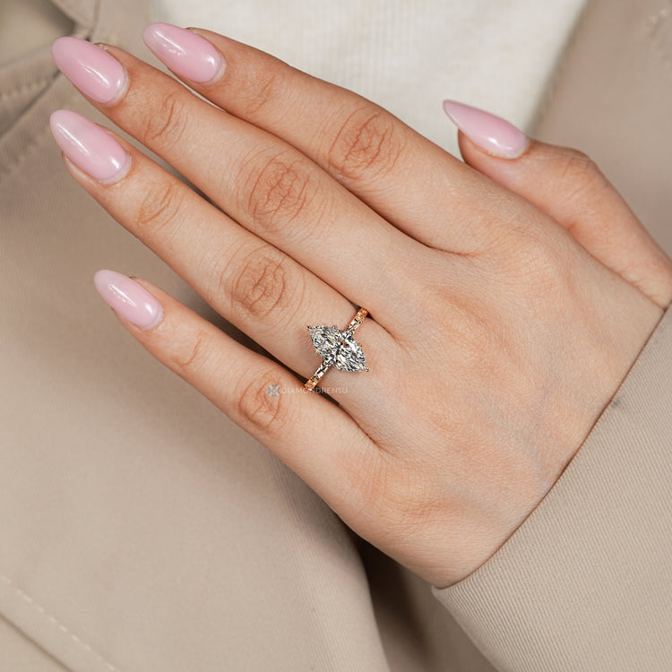 IGI certified marquise cut diamond engagement ring.
