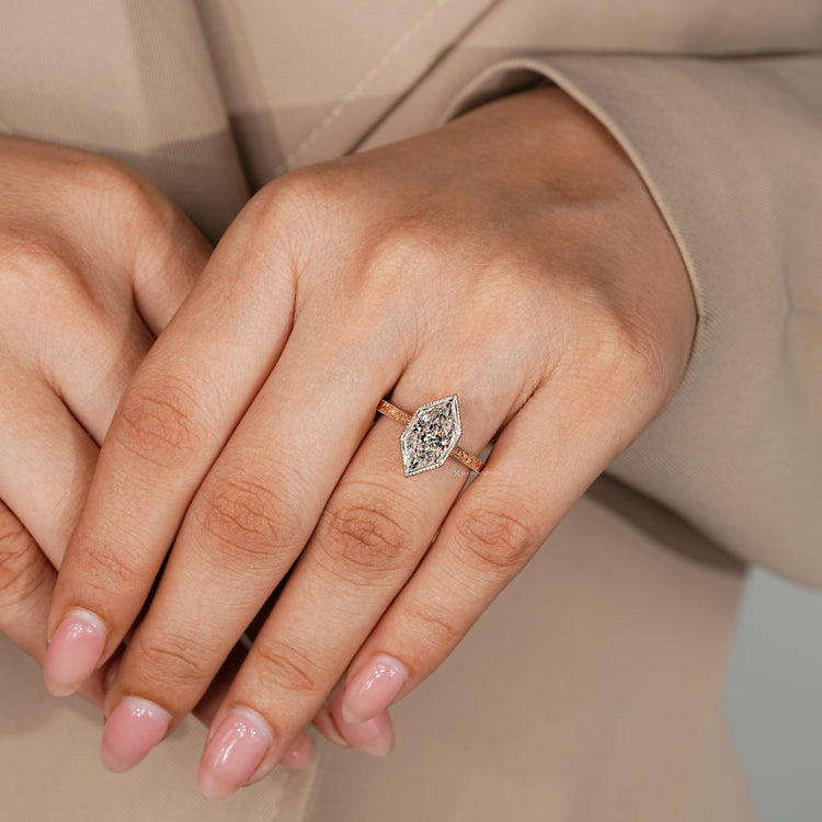 Handmade Dutch marquise diamond ring with bezel setting.