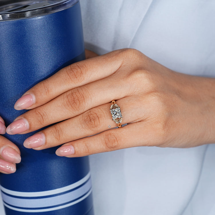 Nature inspired princess cut diamond ring with tulip setting.