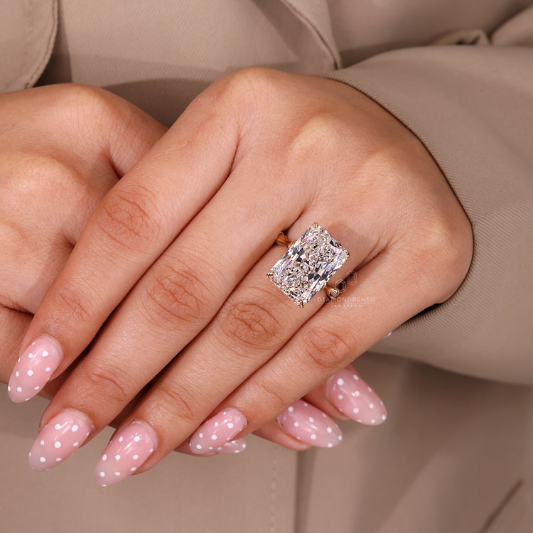 Bamboo design band ring with radiant cut diamond.