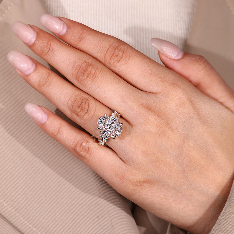 Oval diamond ring available in multiple carat sizes.