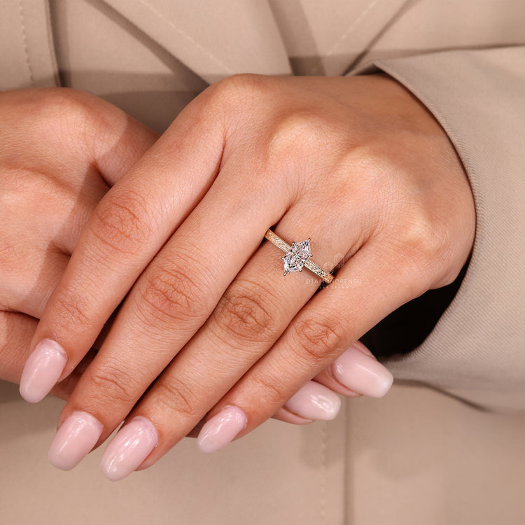Dutch marquise diamond ring with vintage ocean wave look.