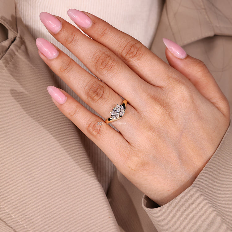 Oval cut ring with pinky style and basket setting.