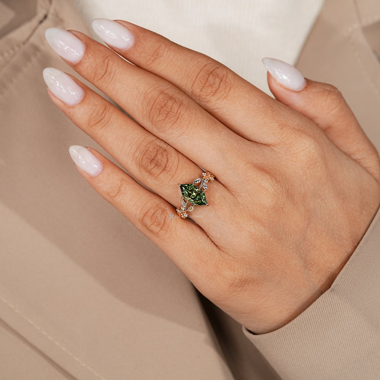 Lab grown diamond ring with green centre diamond.