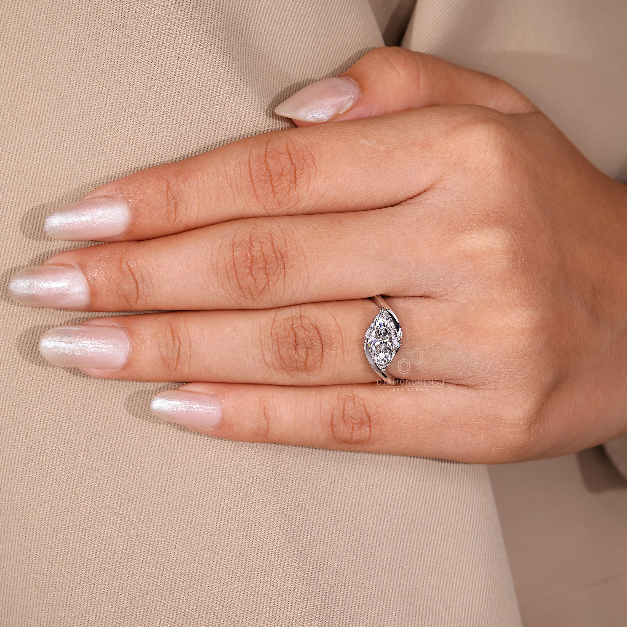 Custom engagement ring with bypass band style.
