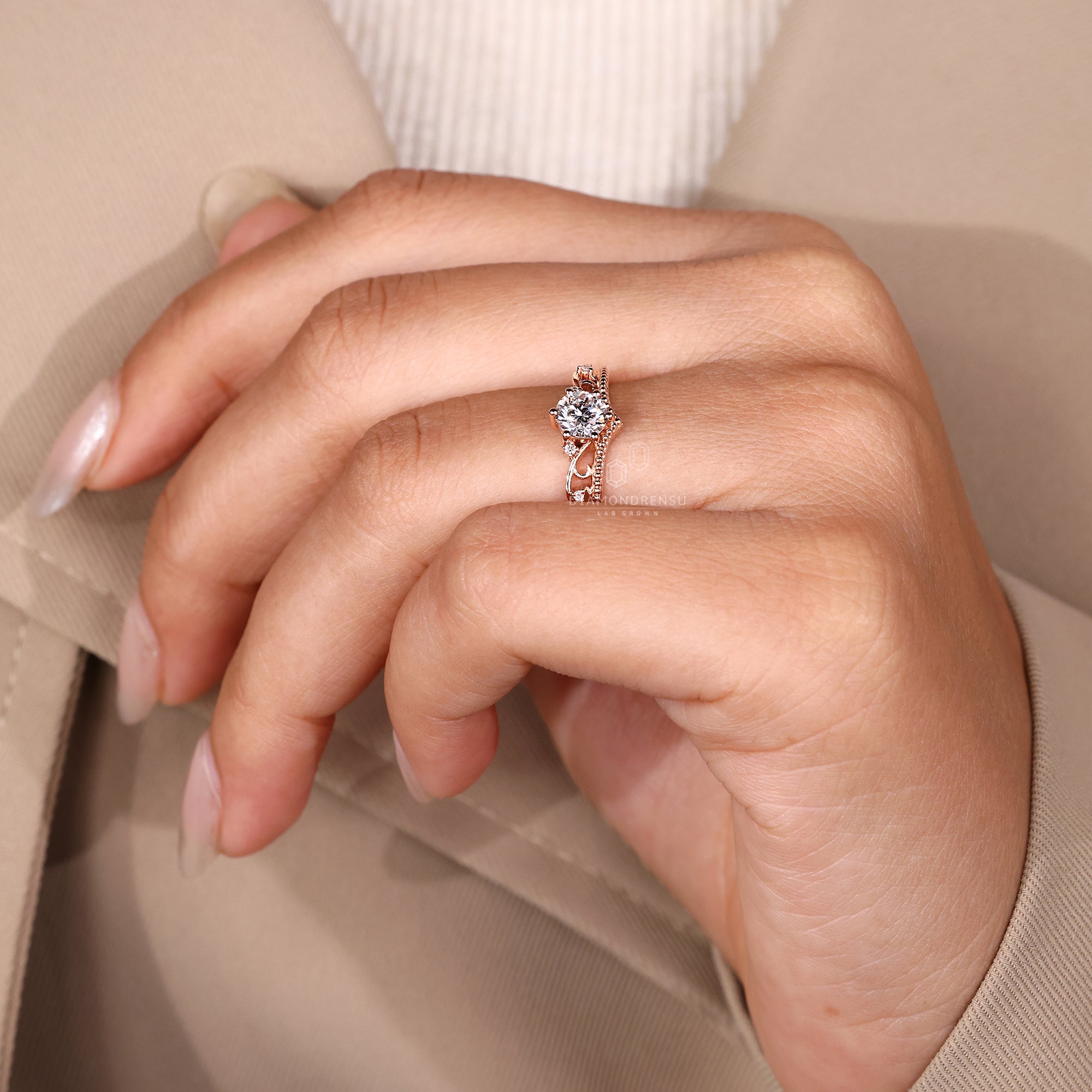 Rose gold diamond ring with vintage details.
