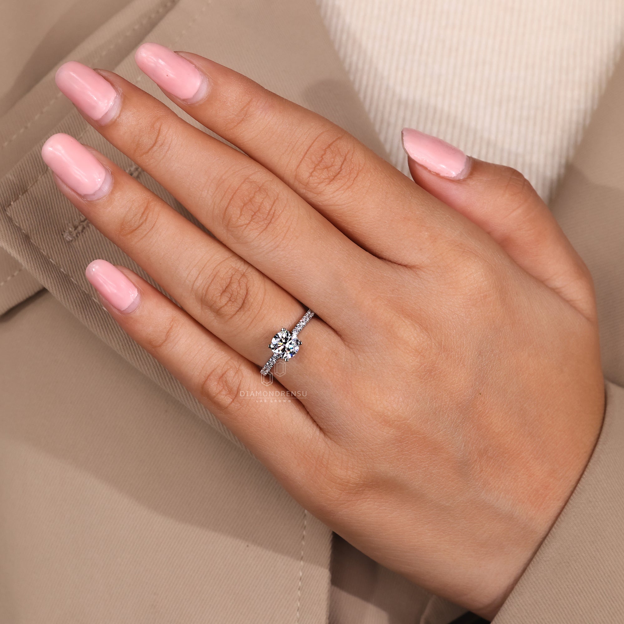 Custom engagement ring with round center.
