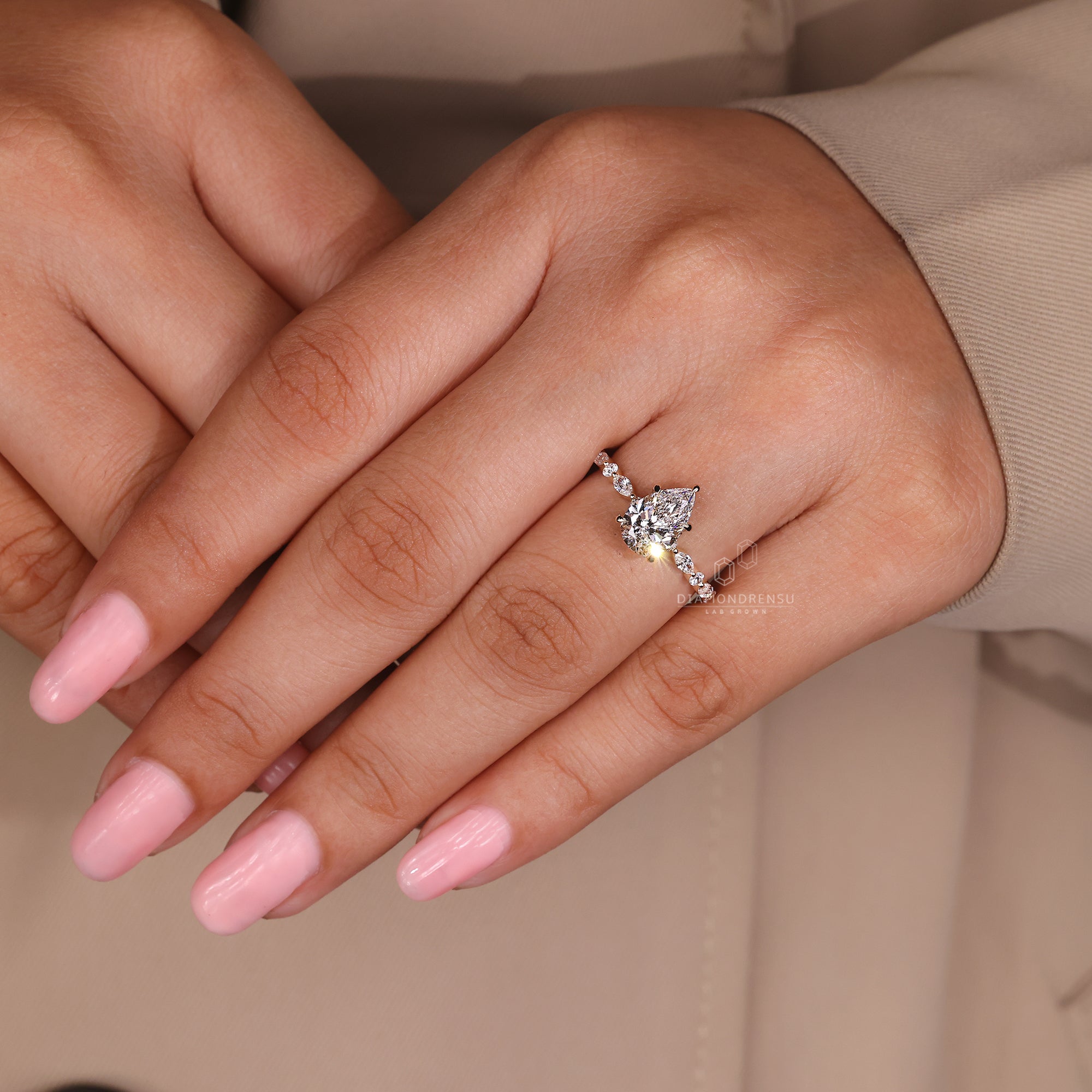 Designer engagement ring with unique stone layout.
