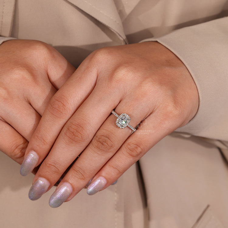 Cathedral setting ring with oval center diamond.
