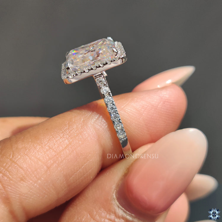 Moissanite ring in halo engagement ring setting
