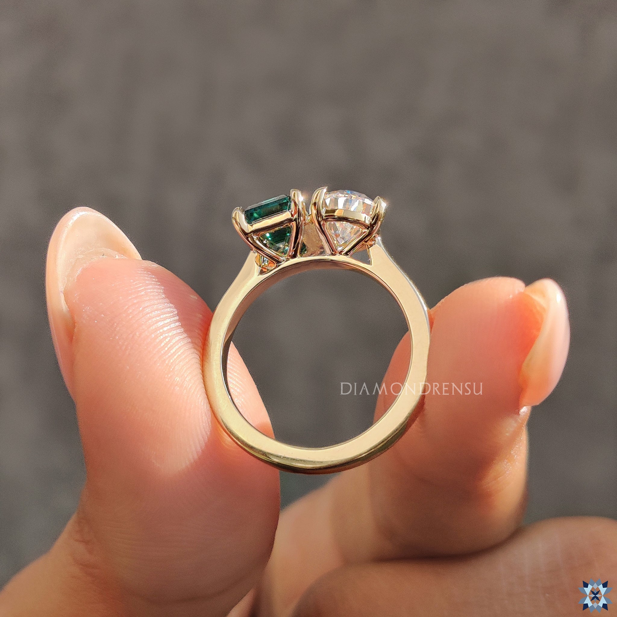 Moissanite ring in 2 stone ring setting
