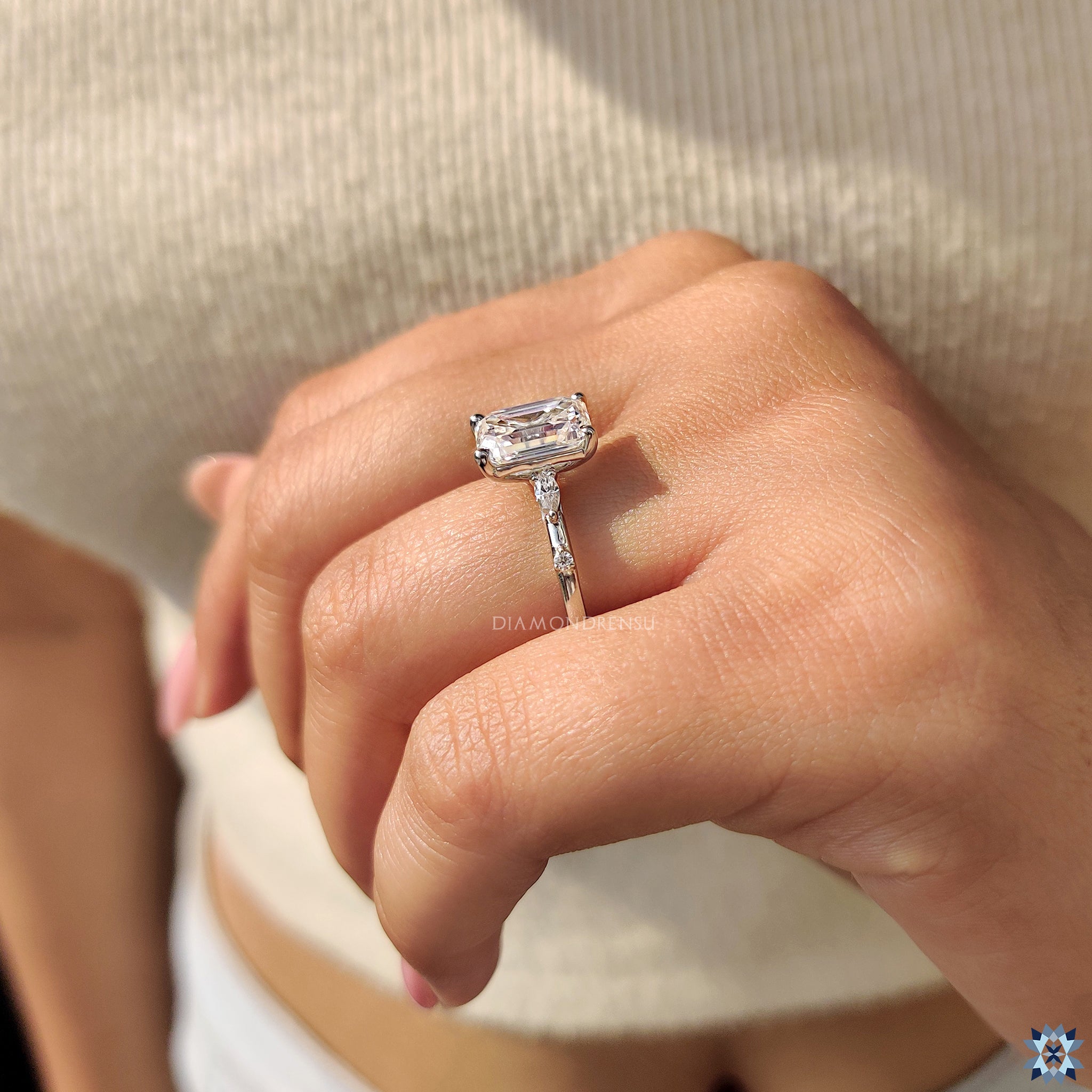 Muse ring with emerald cut ring
