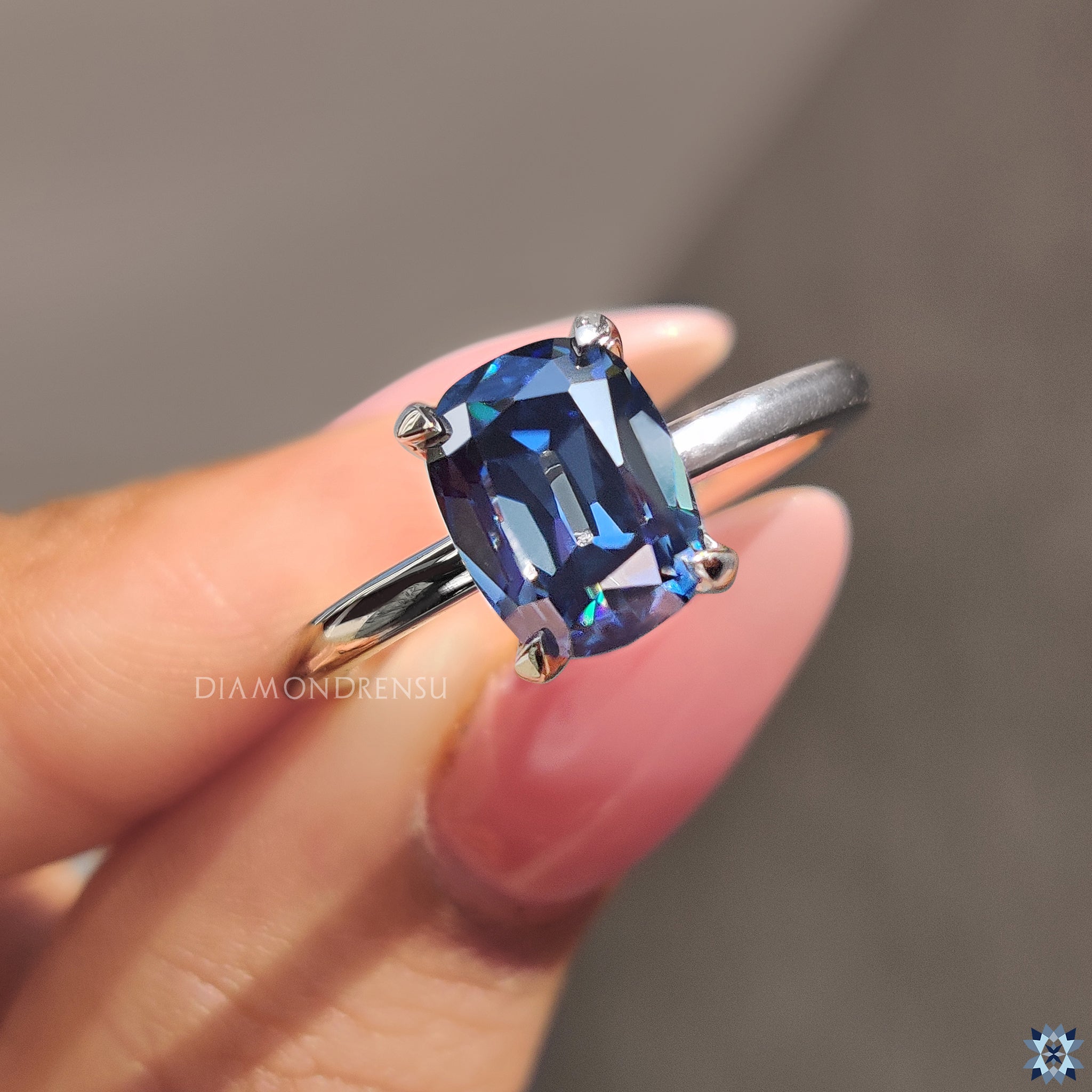 Royal blue Moissanite ring with prong setting
