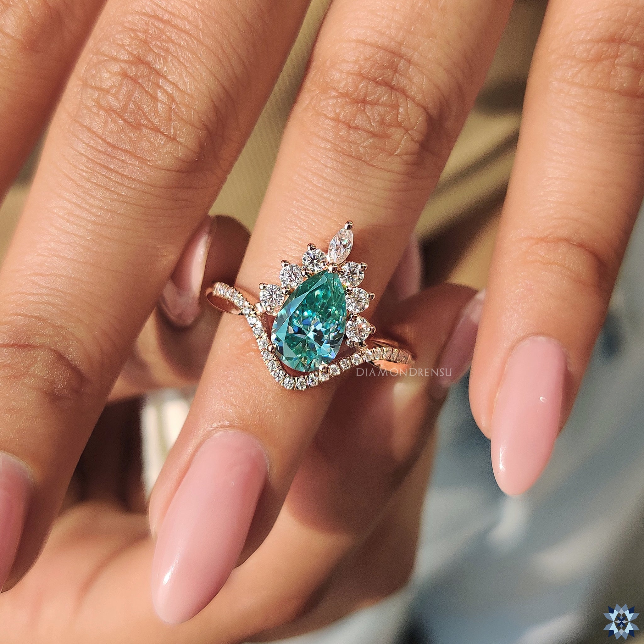 Buy Moissanite ring in twisted pave halo style.
