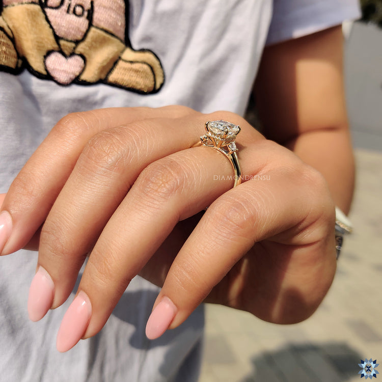 Moissanite ring UK crafted with hidden halo and radiant cut centre stone.
