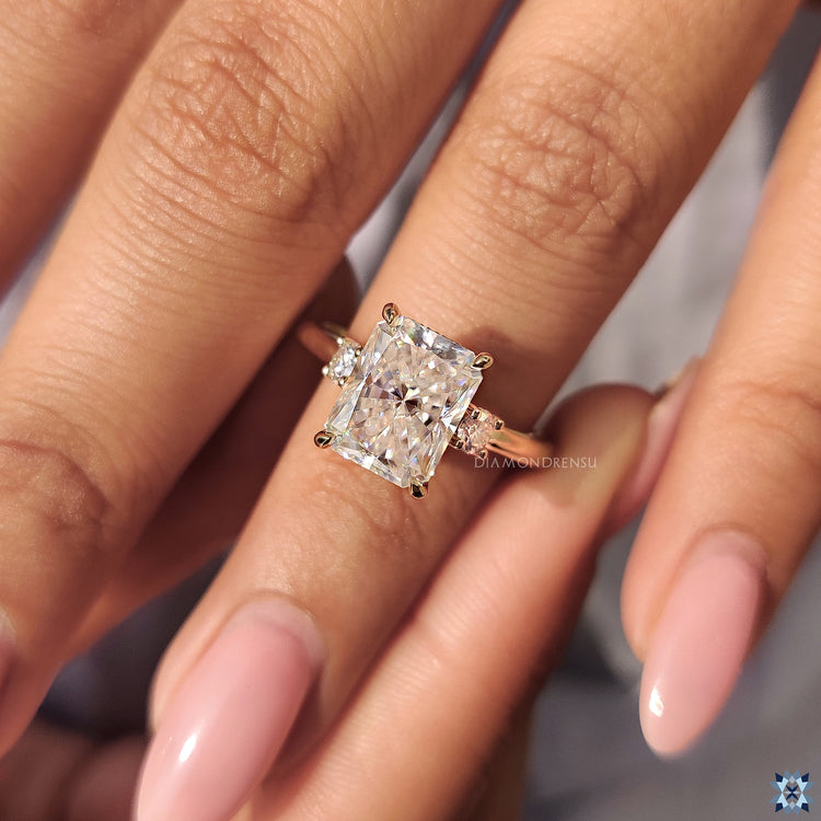 Handmade jewellery with three moissanite stones and secure claw prong.
