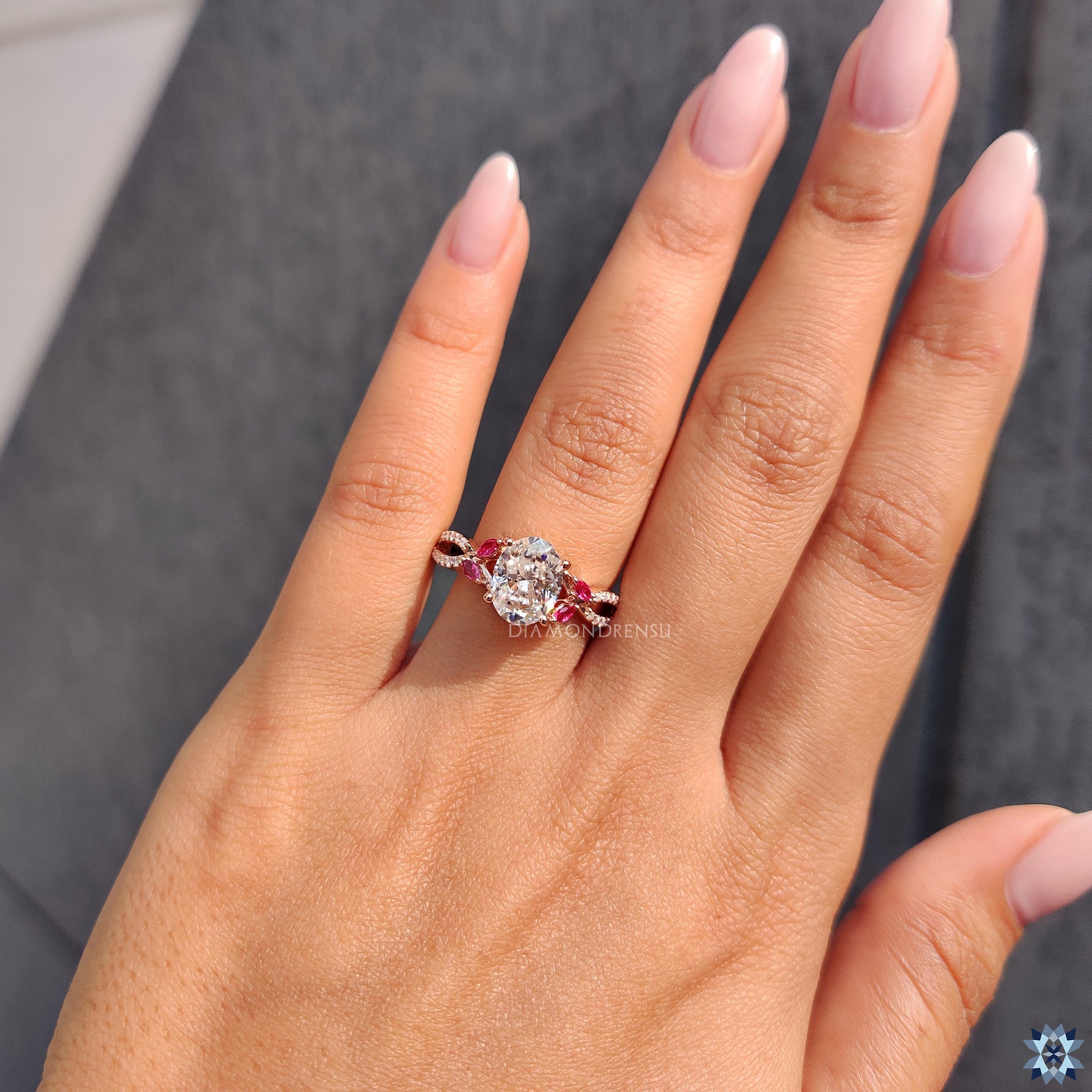 Buy moissanite ring from Diamondrensu UK with custom oval and side stone design.
