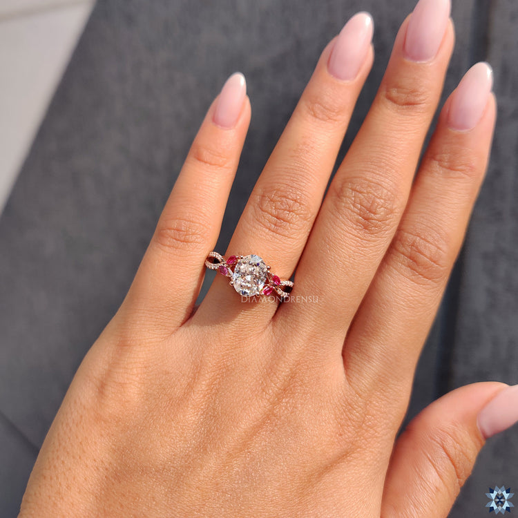 Buy moissanite ring from Diamondrensu UK with custom oval and side stone design.
