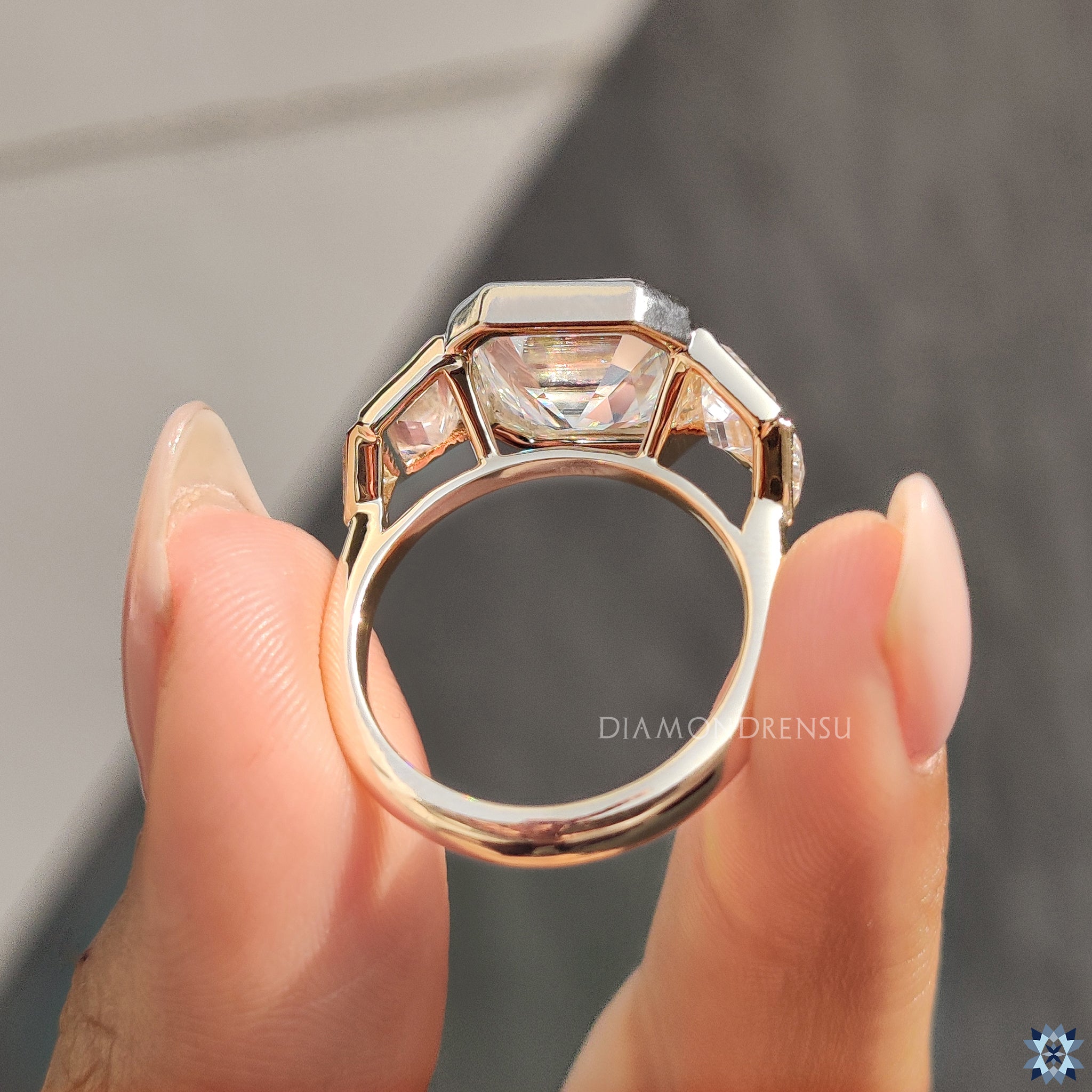 Yellow gold ring in asscher cut engagement ring style
