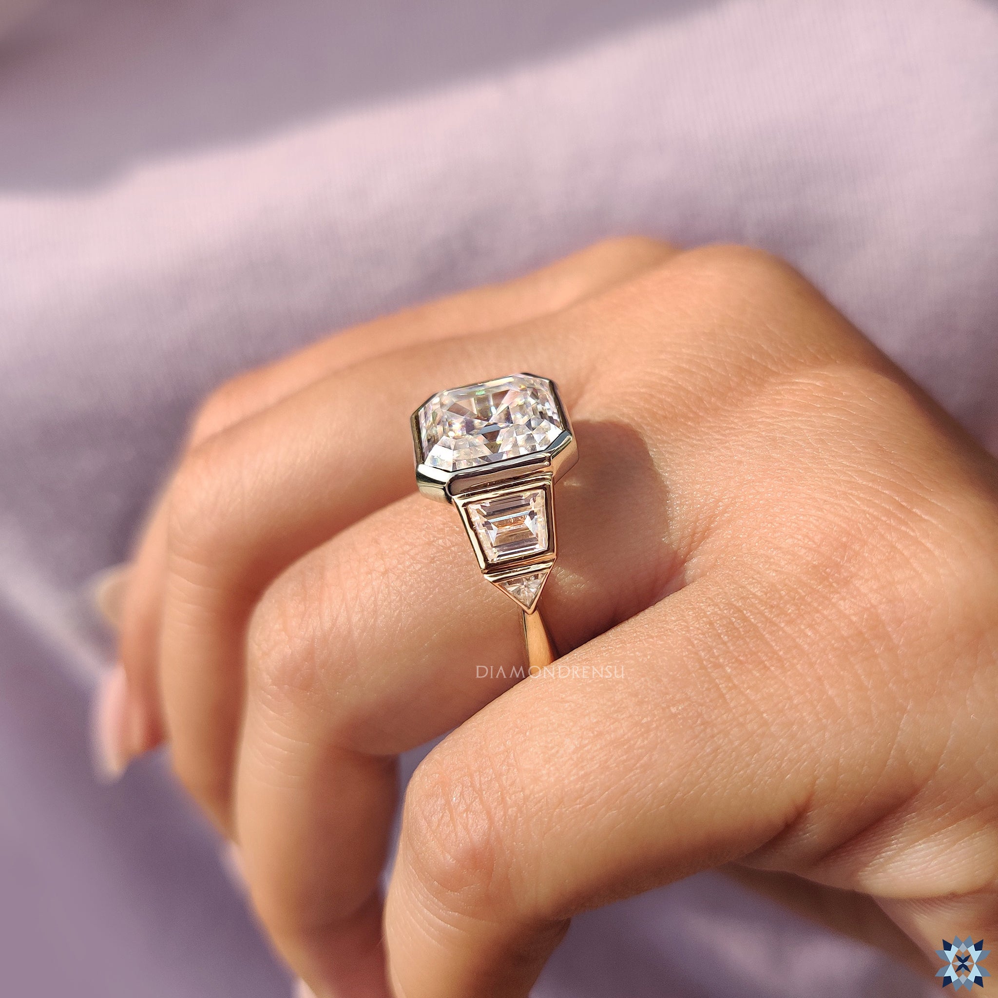 Tapered shank ring in triangle cut ring setting
