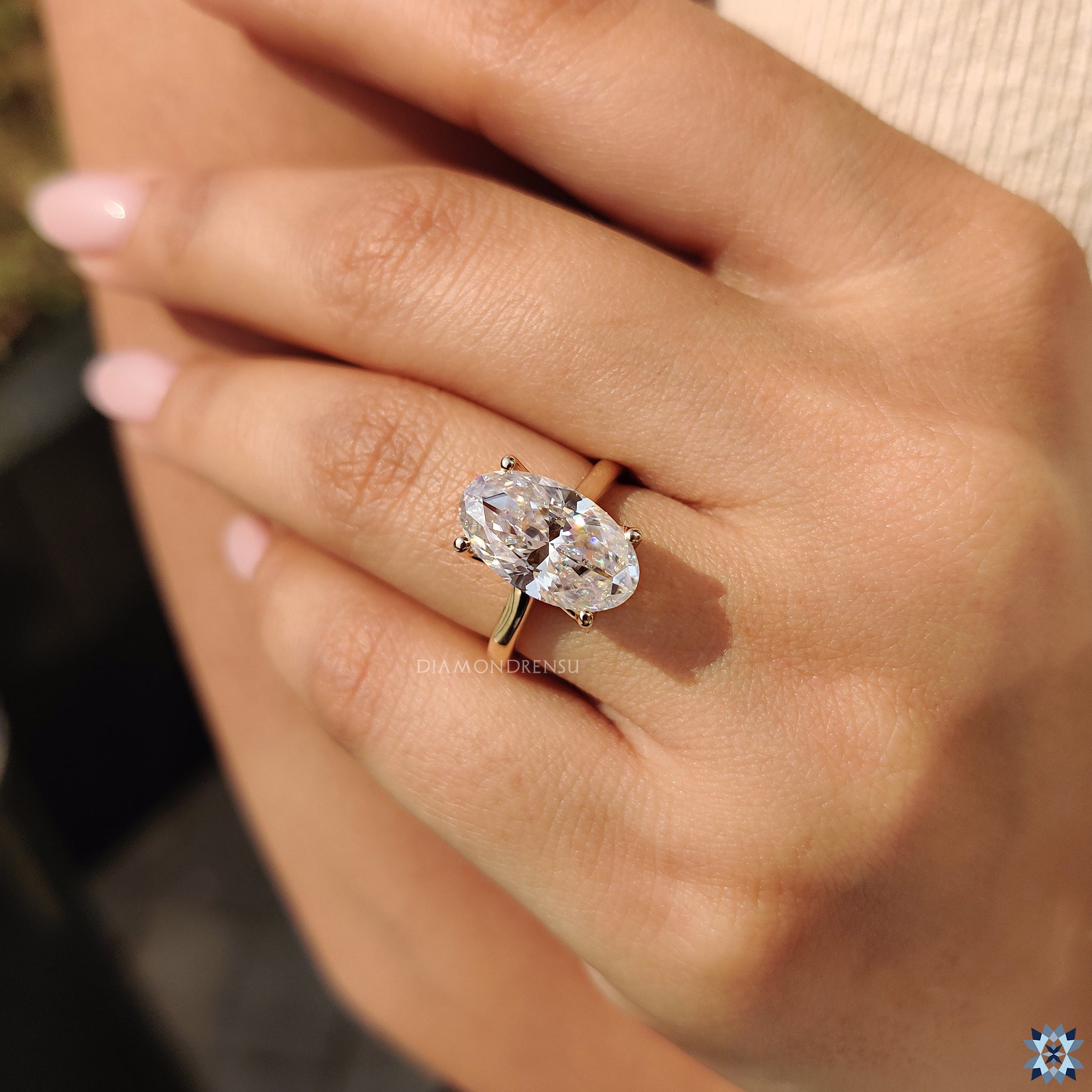 Yellow gold ring in custom engagement ring style
