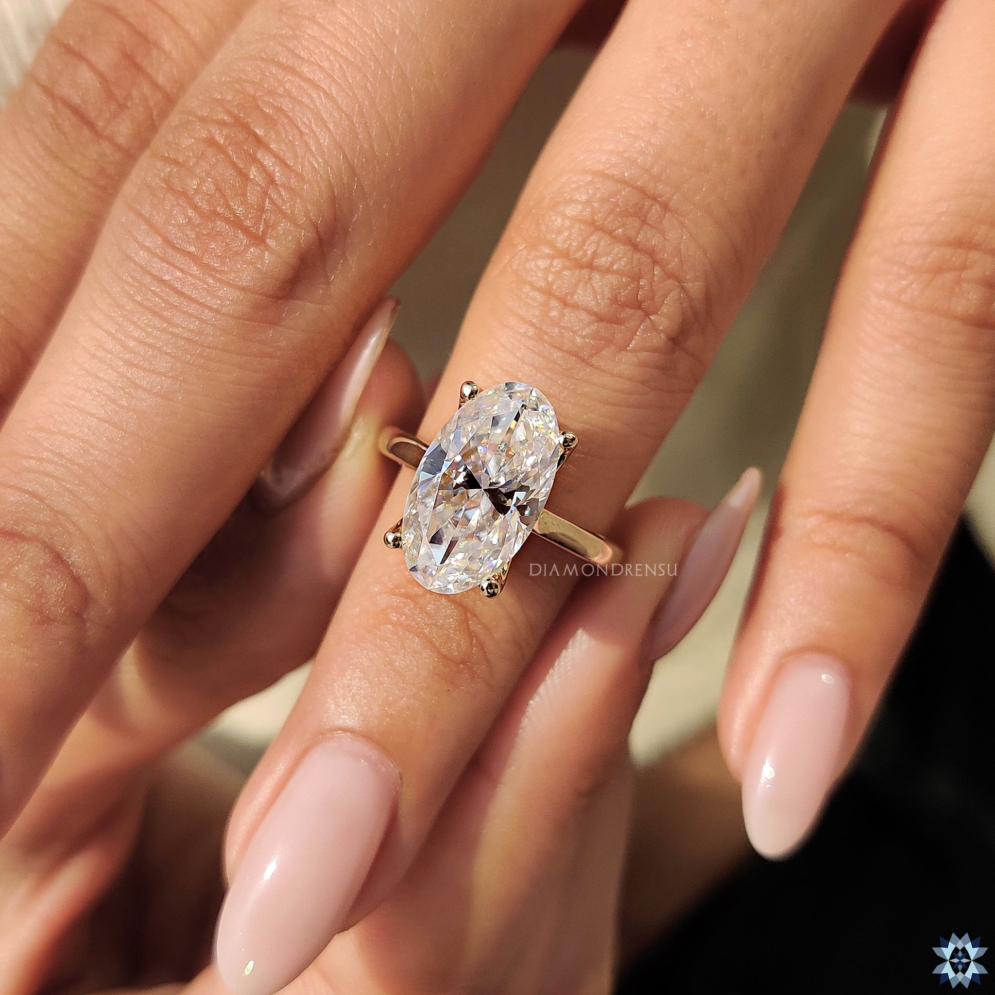 Moval Cut ring with prong setting
