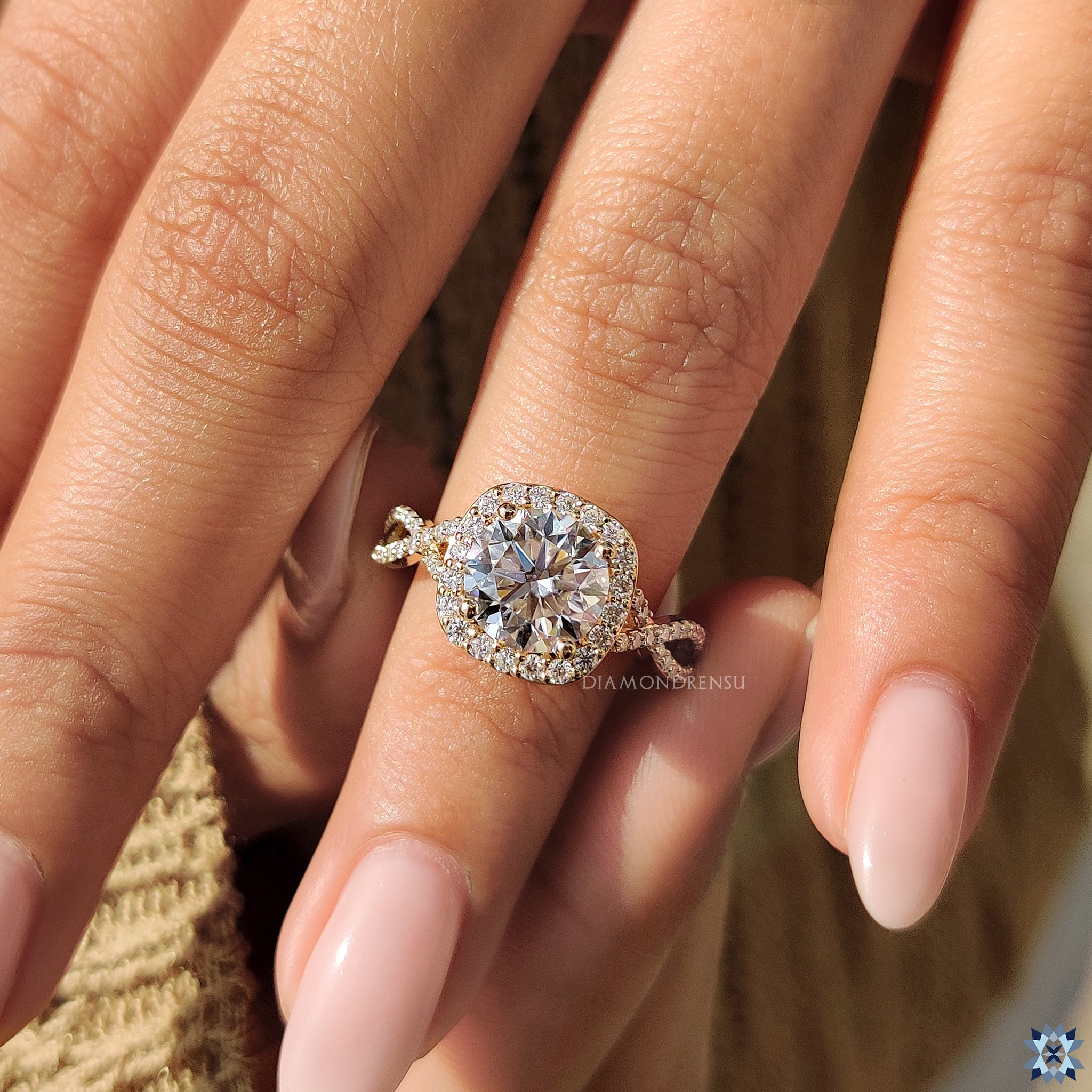 Moissanite ring UK with twisted pave and handmade round moissanite.
