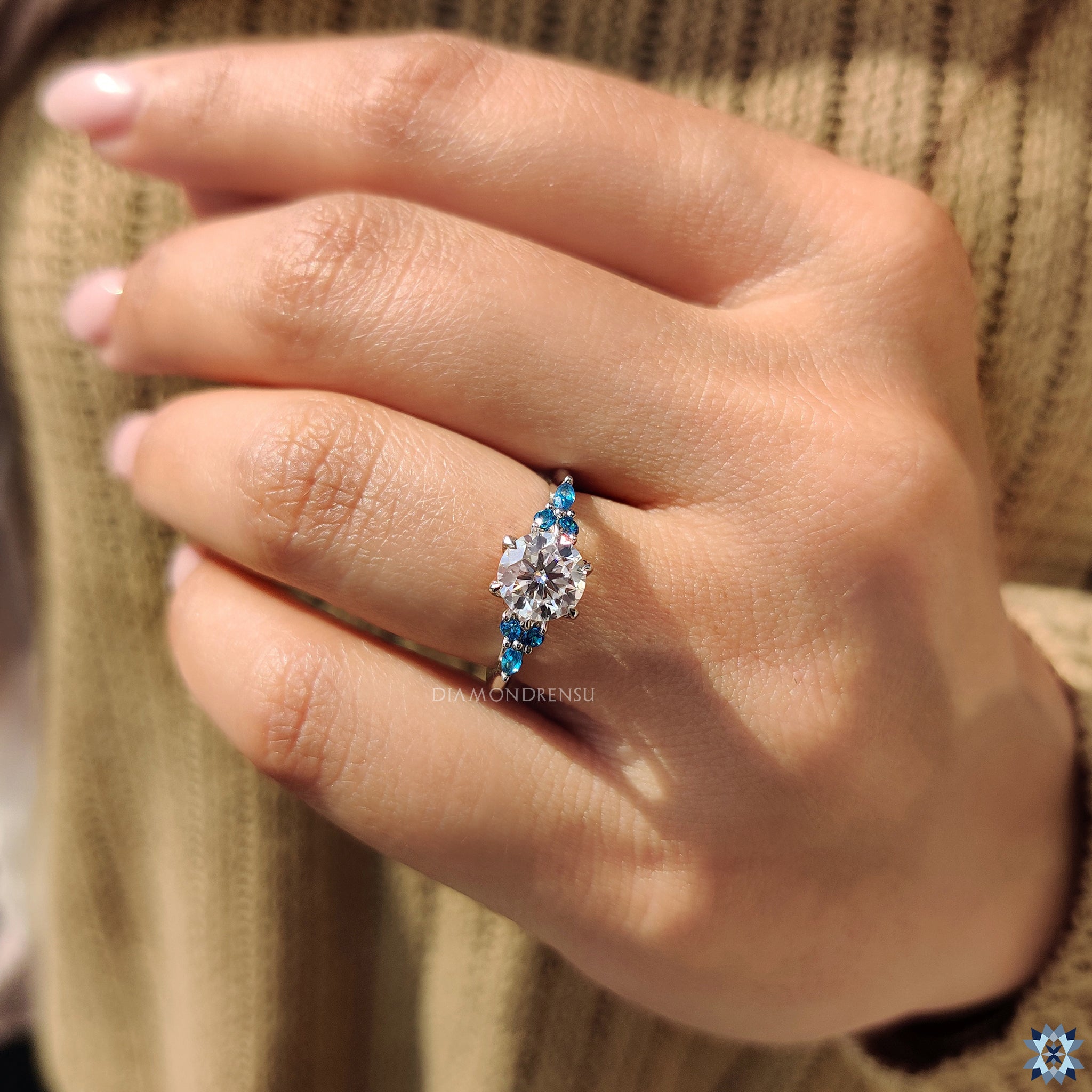 Blue moissanite ring in moissanite ring setting
