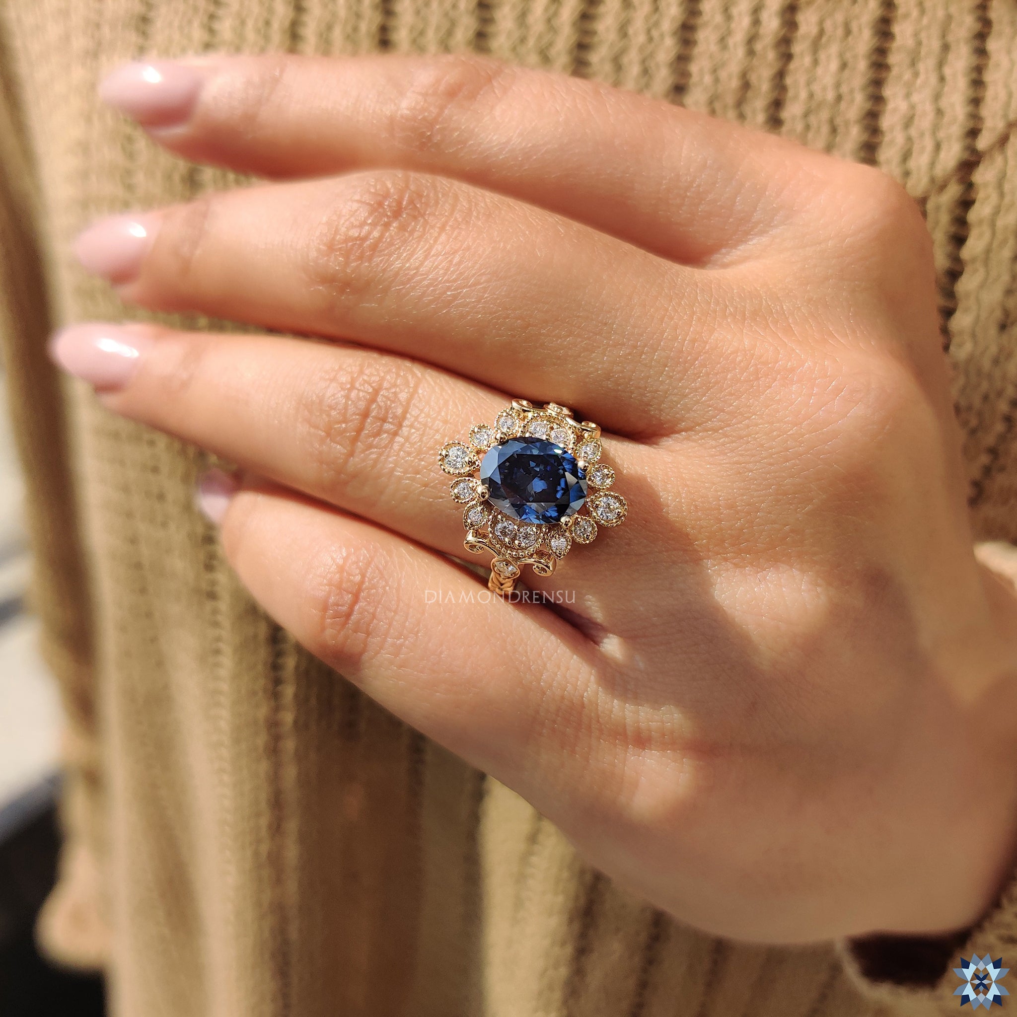 Peekaboo ring with handmade blue moissanite and vintage-inspired setting.
